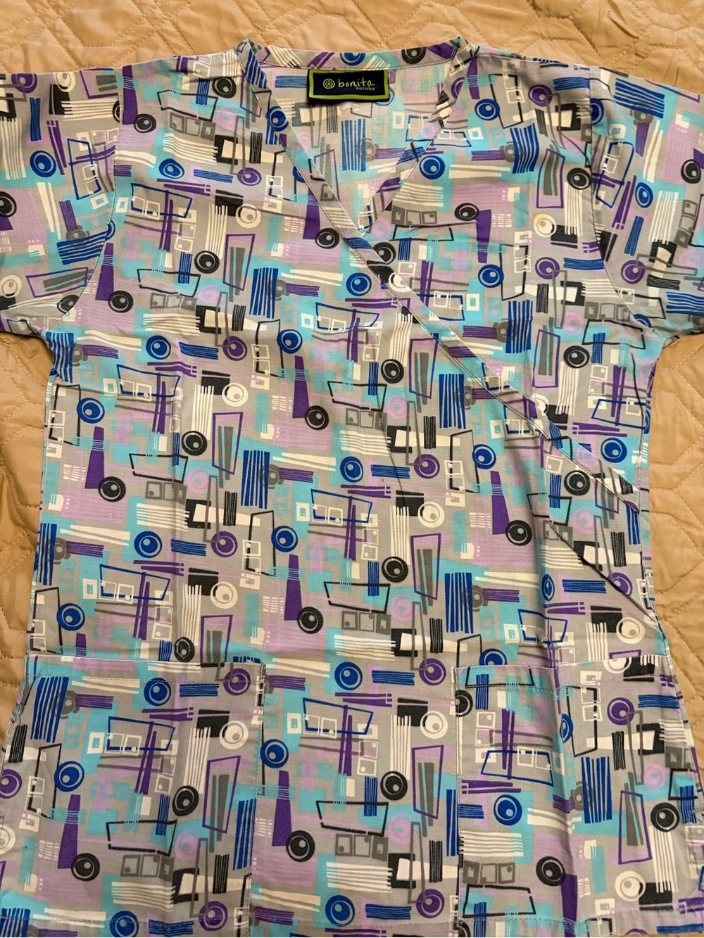 Bonita women’s Geometric Print Scrub Top in Purple, Teal & Gray